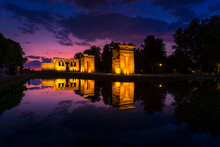 Amazing View Of Temple Of Debod Located Near Pond In Madrid At Sundown
