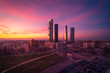 © Javier Martinez/ADDICTIVE STOCK - Cuatro Torres Business Area with skyscrapers reflecting bright sundown light in evening in Madrid