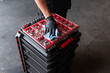 © Manuel Ruiz/ADDICTIVE STOCK - Unrecognizable male mechanic spraying tool box with detergent during work in professional garage