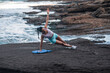 © Pablo Garcia/ADDICTIVE STOCK - Determined female athlete balancing in side plank while doing exercises during workout at seaside