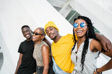 Group Of Cheerful African American Stylish People Standing Together On The Street Looking At Camera