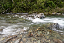 Rapid Section Of The Te Hoiere/Pelorus River Flowing Over Rocks And Through Forest. Pelorus Bridge, Marlborough, New Zealand.