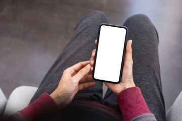 cell phone blank white screen mockup.woman hand holding texting using mobile on desk at office.background empty space for advertise.work people contact marketing business,technology