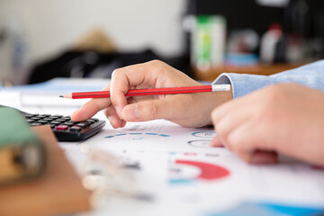 Wall Mural - A businessman or investor at work