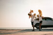 © Garun Studios - Asian family vacation holiday,Happy family, parents holding children flying in the sky.Concept family and Holiday and travel.