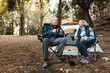 © Rawpixel.com - Happy retired couple having coffee by the tent in the forest