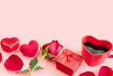 Fototapeta Tulipany - Pastel pink background with red hearts, gifts, heart shaped cup of coffee and rose. Valentine Day, anniversary and birthday concept. Flat lay, closeup and copy space