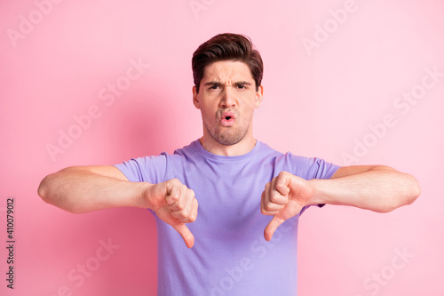 Photo of young person show two hands thumbs down poor quality wear magenta outfit isolated on pink color background