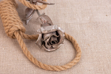 Wall Mural - Life is short, suicide rope noose on linen canvas and iron rose flower.