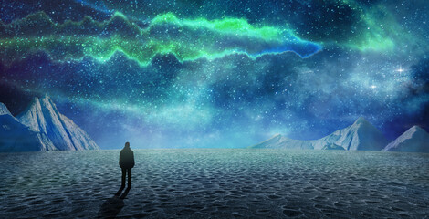 Wall Mural - silhouette of a man in alien desert landscape
