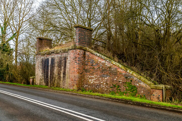 Wall Mural - The remains of the old railway bridge on the Rugby Stamford railway at Lubenham, UK