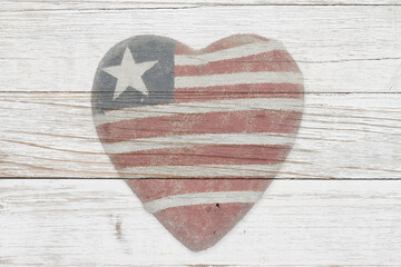 Wall Mural - Old heart American flag on wood