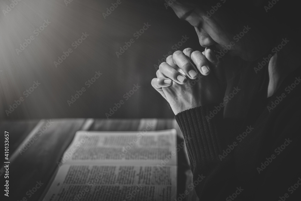 woman hands praying to god with the bible. Woman Pray for god blessing. Religious beliefs Christian life crisis prayer to god. - obrazy, fototapety, plakaty 
