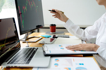 Poster - Businessmen looking and point at the computer monitor