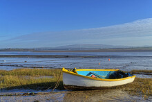 A Beached Yellow Rowing Boat At Sunderland Point