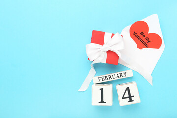 Canvas Print - February block calendar with gift box, envelope and text Be My Valentine on blue background