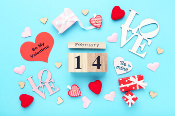 Wall Mural - February block calendar with colorful hearts and gift boxes on blue background