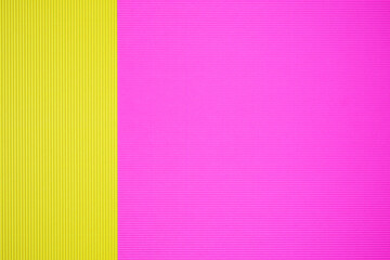 Pink and yellow two tone color paper background with stripes. Abstract background modern hipster futuristic. Texture design