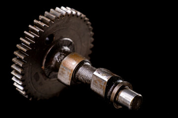 Wall Mural - Camshaft from a small internal combustion engine. Accessories for repairing drive systems.