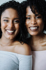 Portrait of two african women next to each other