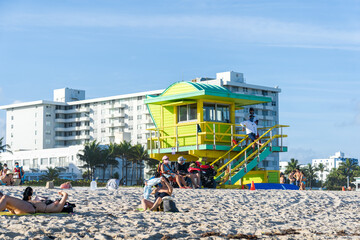 Miami, Florida - January 2, 2021: People Sunbathing in Miami Beach.