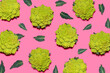 © Gemma Ferrando/Westend61 - Pattern of Romanesco cauliflowers against pink background