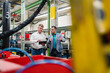 © Daniel Ingold/Westend61 - Male engineer and supervisor working on digital tablet together in factory