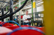 © Daniel Ingold/Westend61 - Mature supervisor holding digital tablet while looking around in factory