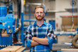 © Daniel Ingold/Westend61 - Portrait of carpenter posing with crossed arms