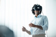 © Joseffson/Westend61 - Young male entrepreneur wearing virtual reality headset in board room at office