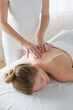 © Rob Lewine/Tetra Images - Woman receiving massage