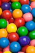 © Bryan Mullennix/Tetra Images - Close-up of multi-colored gumballs