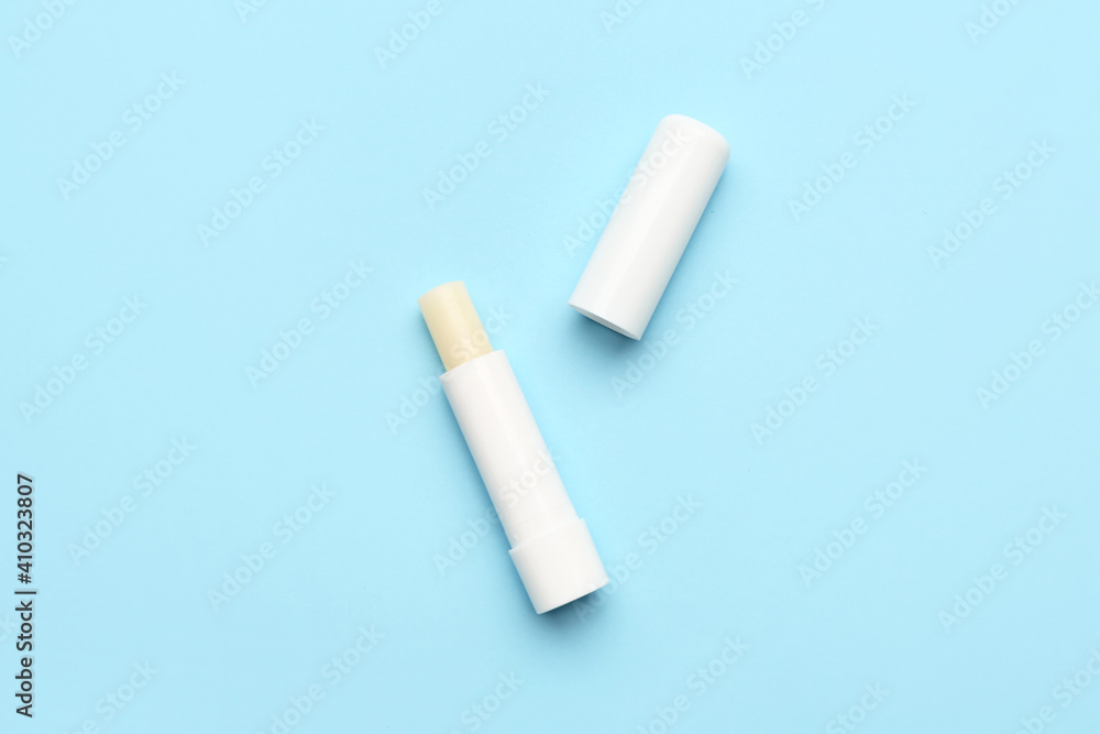 Natural lip balms on color background