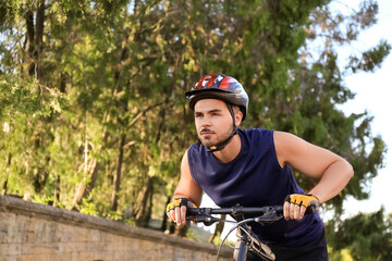 Sticker - Male cyclist riding bicycle outdoors