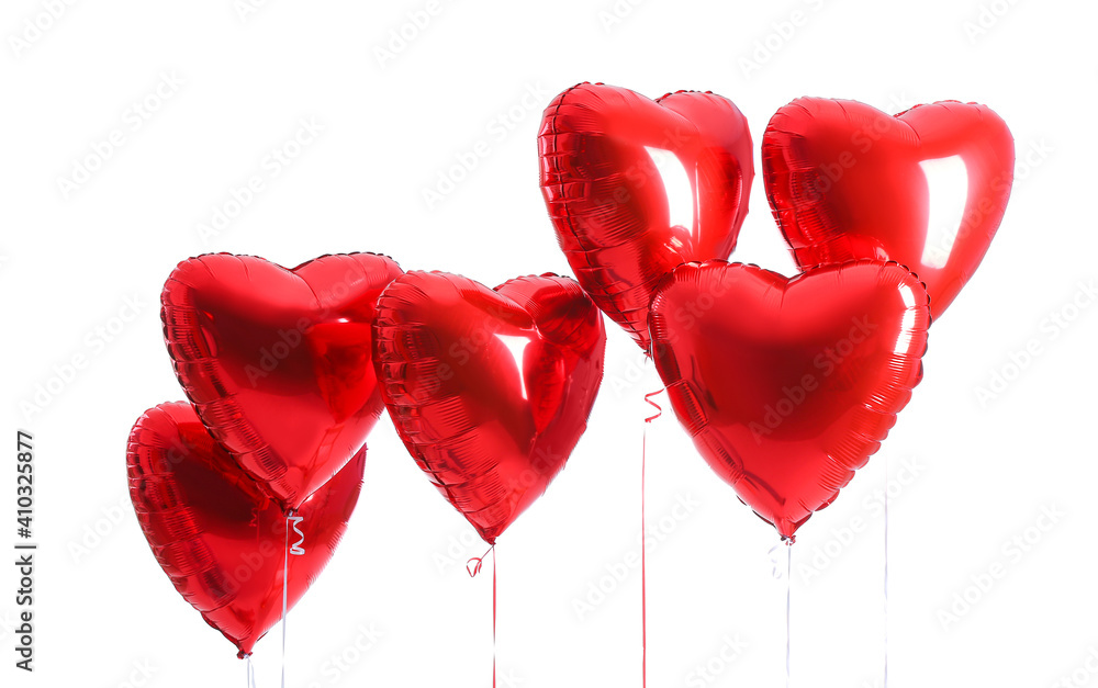 Heart shaped air balloons on white background