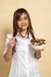 Healthy Asian woman with salad.