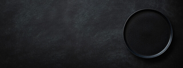 black banner with empty black plate. top view.
