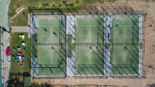Aerial View Of Two People Playing Paddle In A Tennis Court At Papalus Golf Club, Catalonia, Spain.