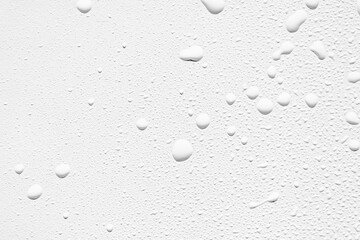 Wall Mural - Water drops on white background, macro