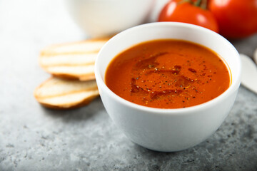 Canvas Print - Homemade spicy tomato soup with grilled bread