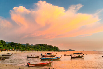 Wall Mural - Sea sunset landscape with fishing boats in lagoon