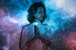 Portrait of a woman connecting with the universe 