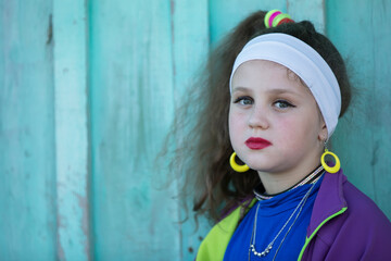 Wall Mural - Little girl with bright makeup in retro style. Child model.