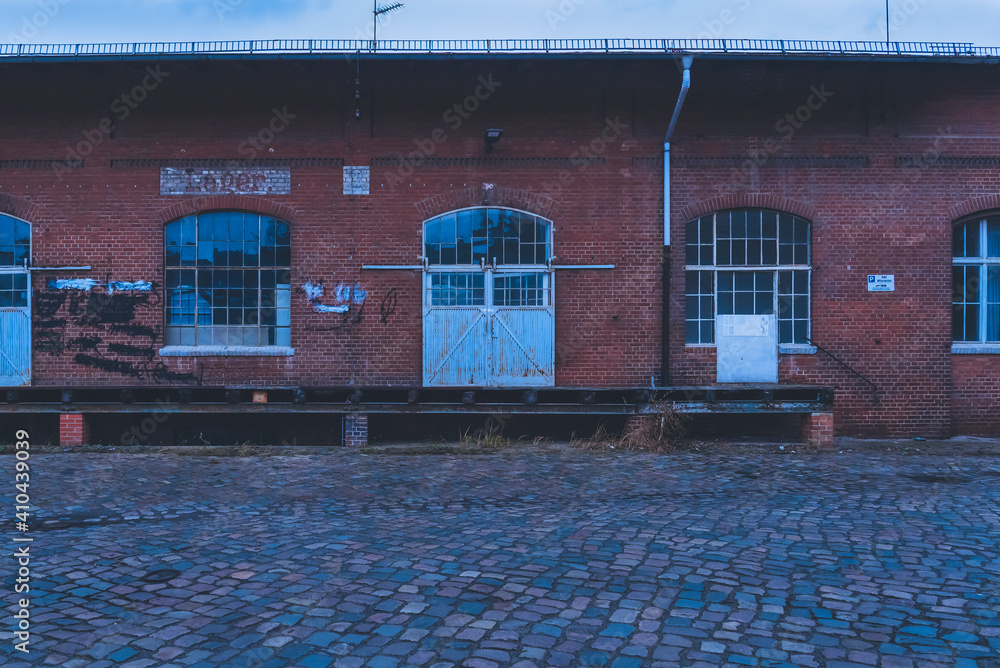 The loading ramp of an old warehouse, loading ramp and a sliding gate ...