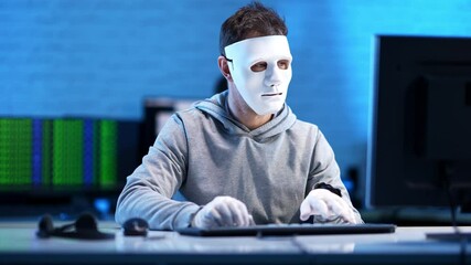 Wall Mural - confident man in white mask and gloves using computer mouse and keyboard indoors. middle shot of con