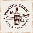 Bottle of rum and saber vector pirate emblem in vintage style isolated on background with removable grunge textures