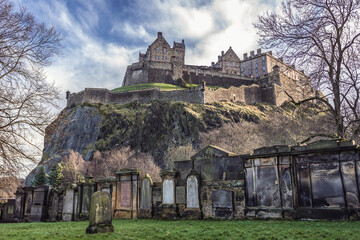 Sticker - Old graves on a graveyard next to Saint Cuthbert Church and castle in Edinburgh city, Scotland