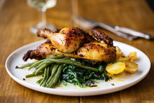 Roasted Poussin With Potatoes, Mashed Swede, Green Beans And Creamy Spinach