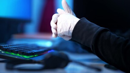 Wall Mural - side view close-up of unrecognizable hacker rubbing hands in white gloves. satisfied coder uploading