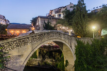 Evening View Of Kriva Cuprija (Crooked Bridge) In Mostar. Bosnia And Herzegovina